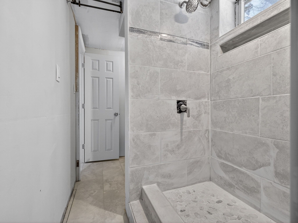 19 Melba Way Boston, MA 02136 - Photo 24 of 34 a bathroom with a shower