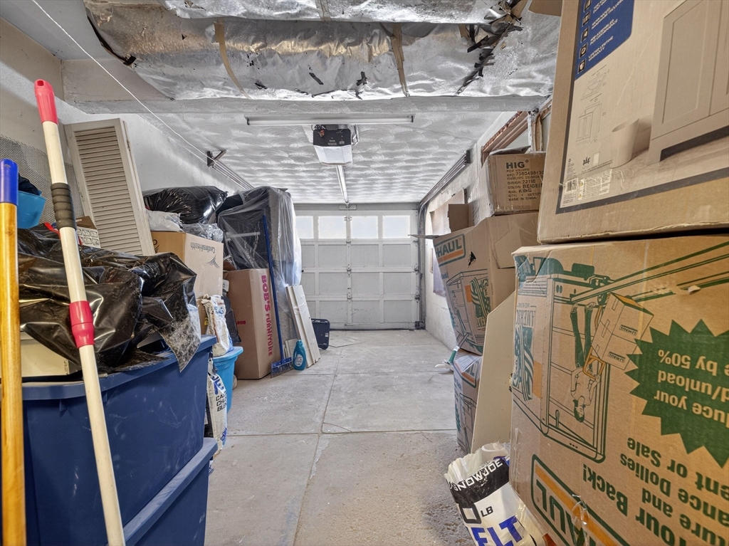19 Melba Way Boston, MA 02136 - Photo 25 of 34 a view of walk in closet with clothes and shoes