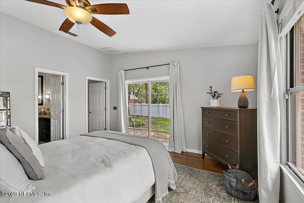 1445 Nicholson Road Jacksonville, FL 32207 - Photo 16 of 31 a bedroom with a bed and a dresser