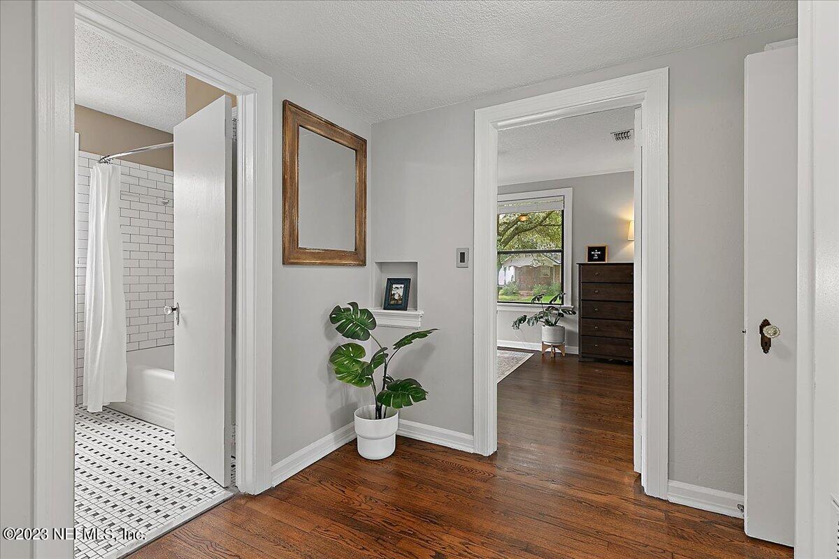 1445 Nicholson Road Jacksonville, FL 32207 - Photo 20 of 31 a view of an entryway of house and wooden floor