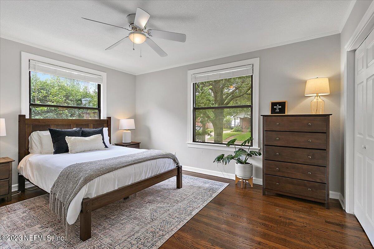 1445 Nicholson Road Jacksonville, FL 32207 - Photo 21 of 31 a bedroom with a bed and a window