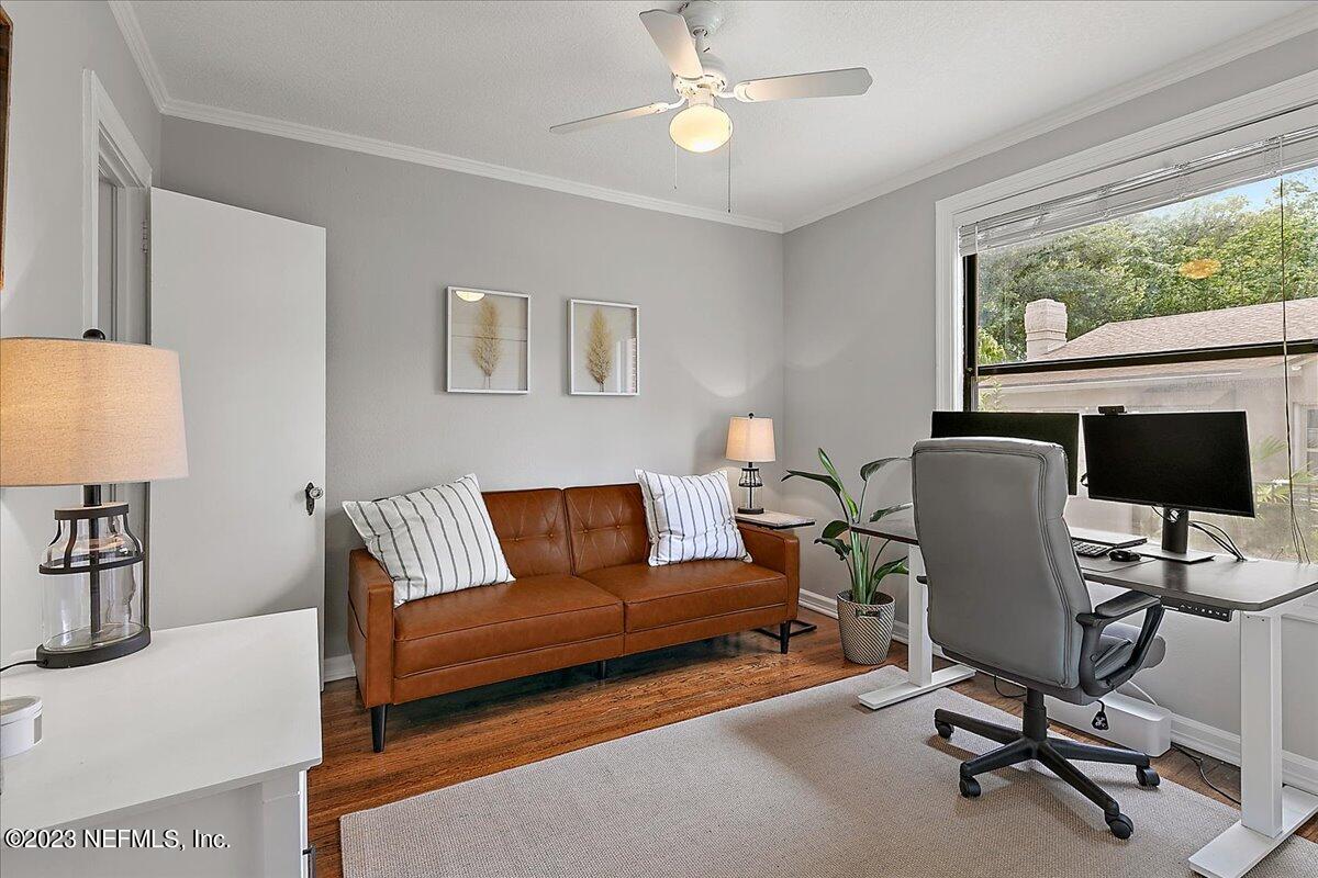 1445 Nicholson Road Jacksonville, FL 32207 - Photo 23 of 31 a view of a livingroom with workspace and a couch