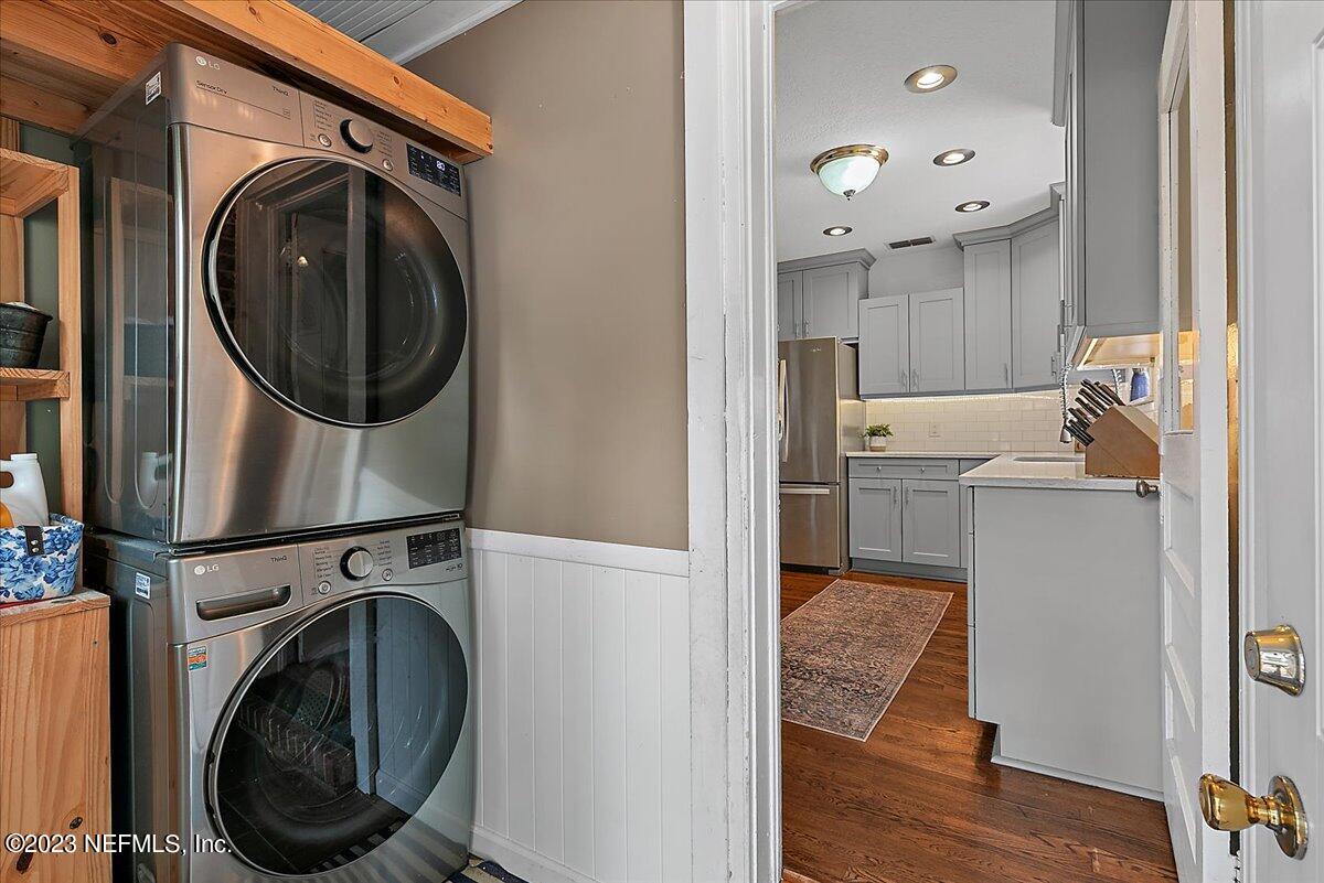1445 Nicholson Road Jacksonville, FL 32207 - Photo 26 of 31 a view of a hallway with washer and dryer