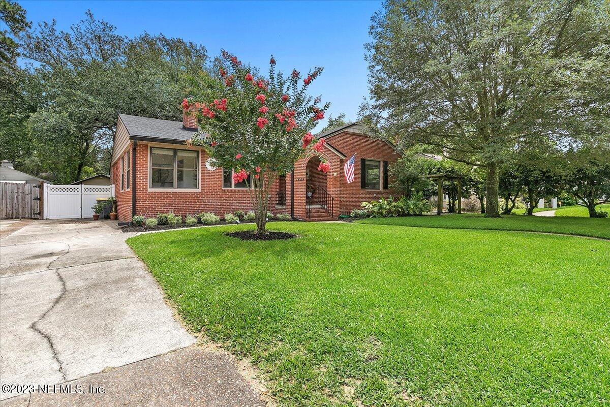 1445 Nicholson Road Jacksonville, FL 32207 - Photo 31 of 31 a front view of house with yard and green space
