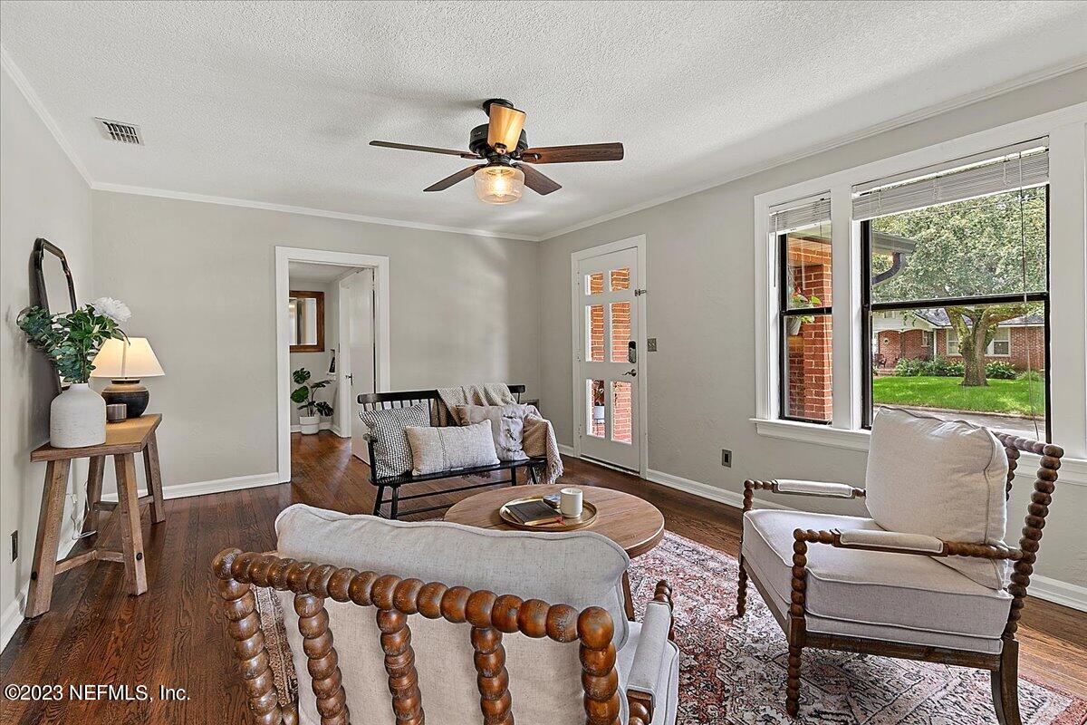1445 Nicholson Road Jacksonville, FL 32207 - Photo 5 of 31 a living room with furniture and a large window