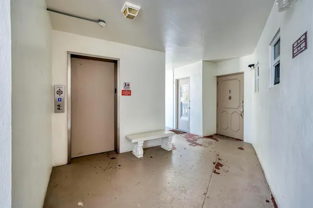 an empty room with a door