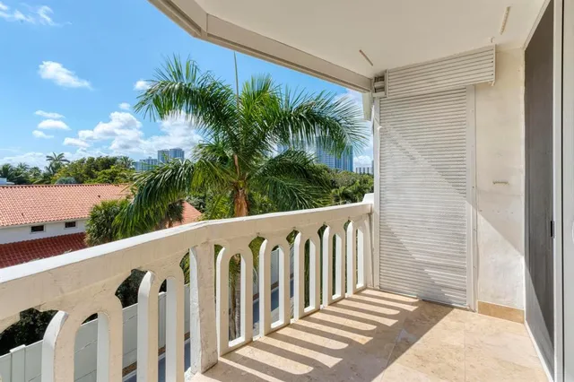 a view of a wooden fence