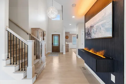 a view of a hallway with windows