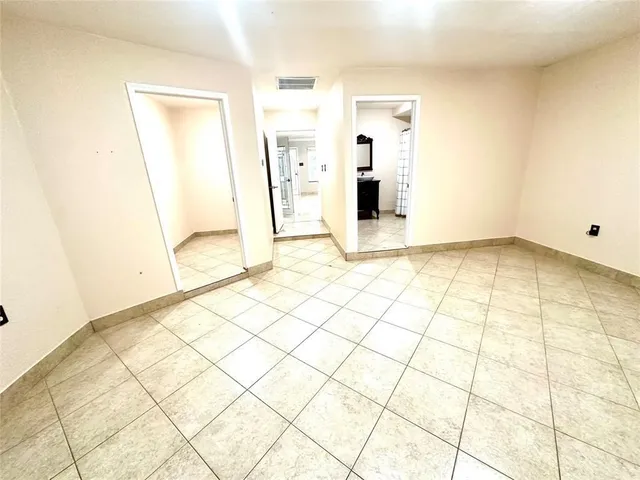 a view of a room & utility room