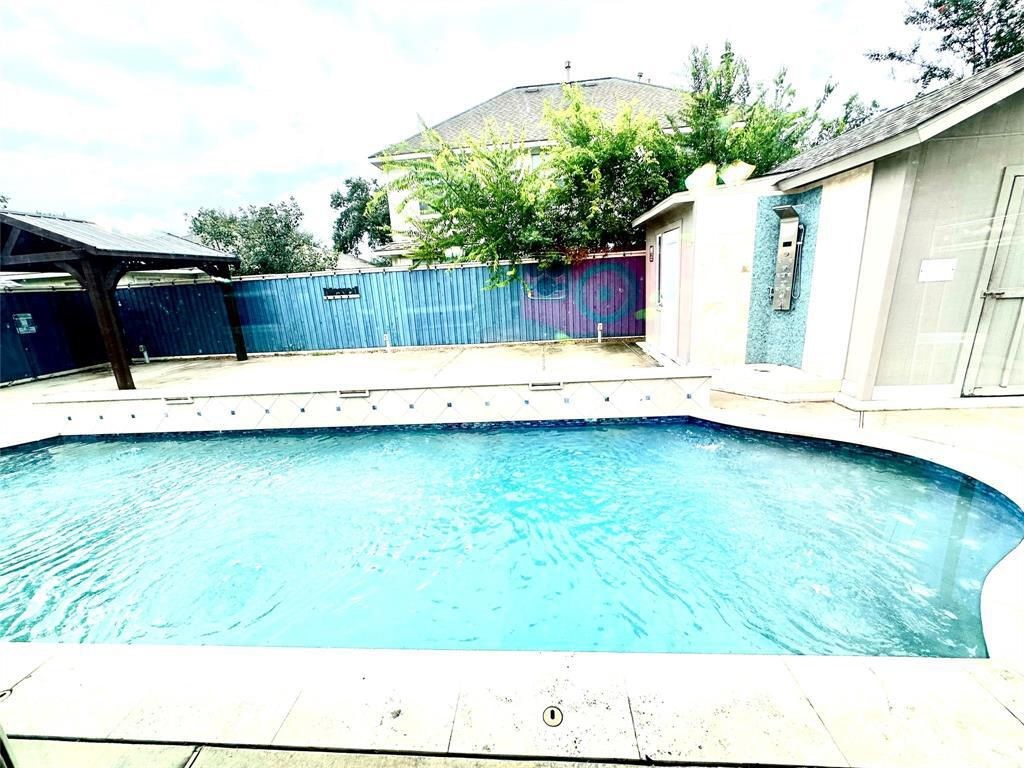 16918 Blend Stone Houston, TX 77084 - Photo 18 of 18 a view of a terrace with wooden floor