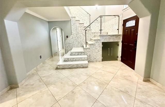 16918 Blend Stone Houston, TX 77084 - Photo 2 of 18 a view of a hallway with entryway
