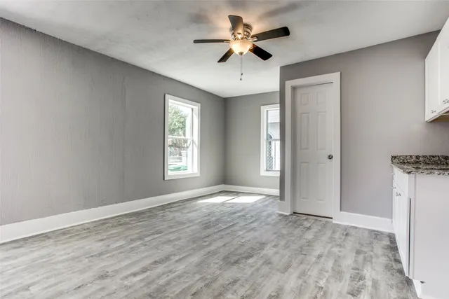 a view of an empty room and window