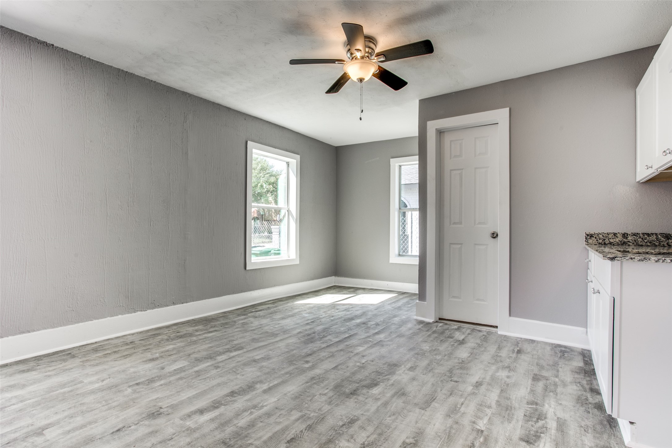 810 Maltby Street, Unit 2 Houston, TX 77011 - Photo 8 of 24 a view of empty room with wooden floor