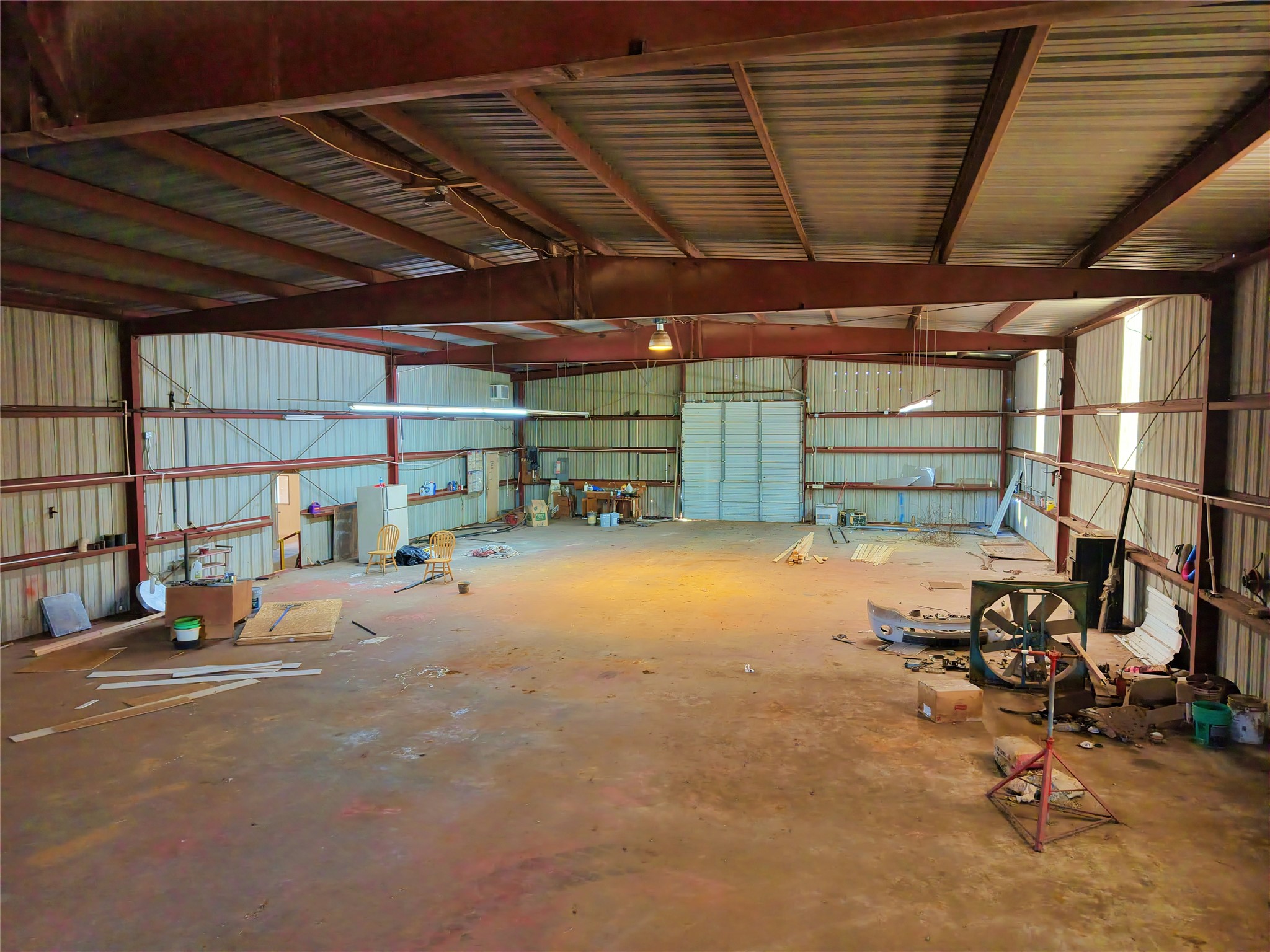 2035 Jeddo Road Rosanky, TX 78953 - Photo 13 of 15 Garage with metal wall