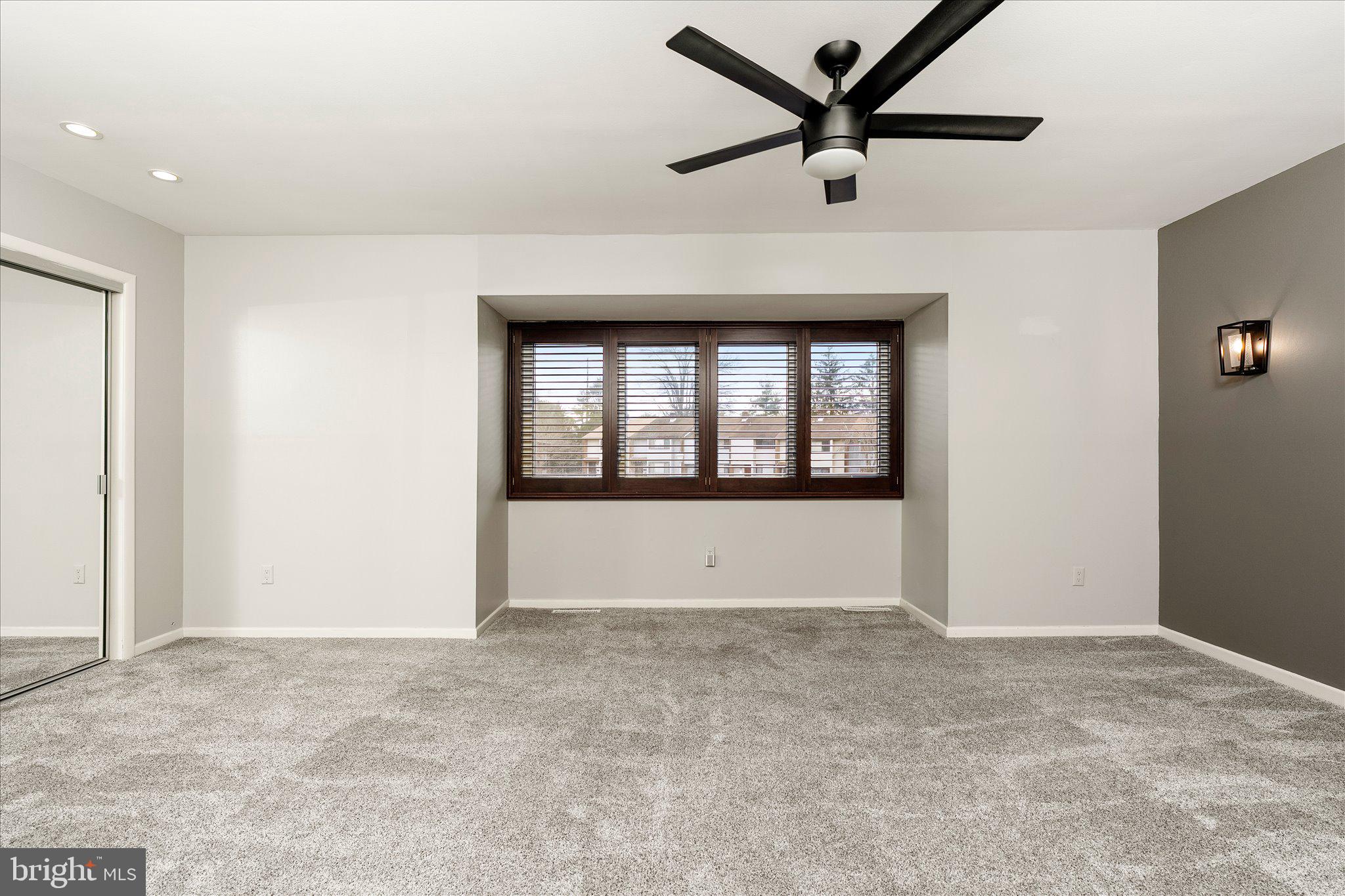 766 Twin Rivers Drive North East Windsor, NJ 08520 - Photo 23 of 31 a view of an empty room with a window