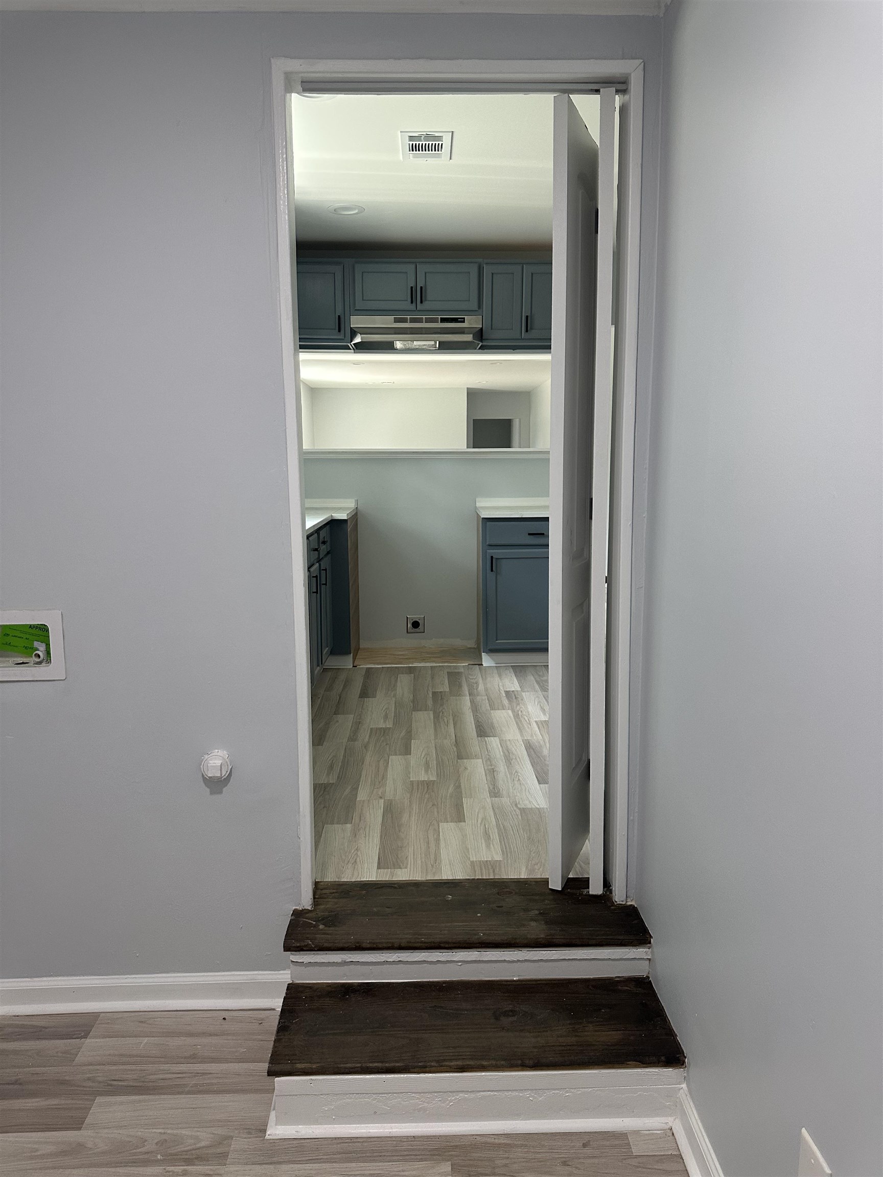 3402 Lakeview Road Memphis, TN 38116 - Photo 11 of 30 Stairway featuring wood finished floors