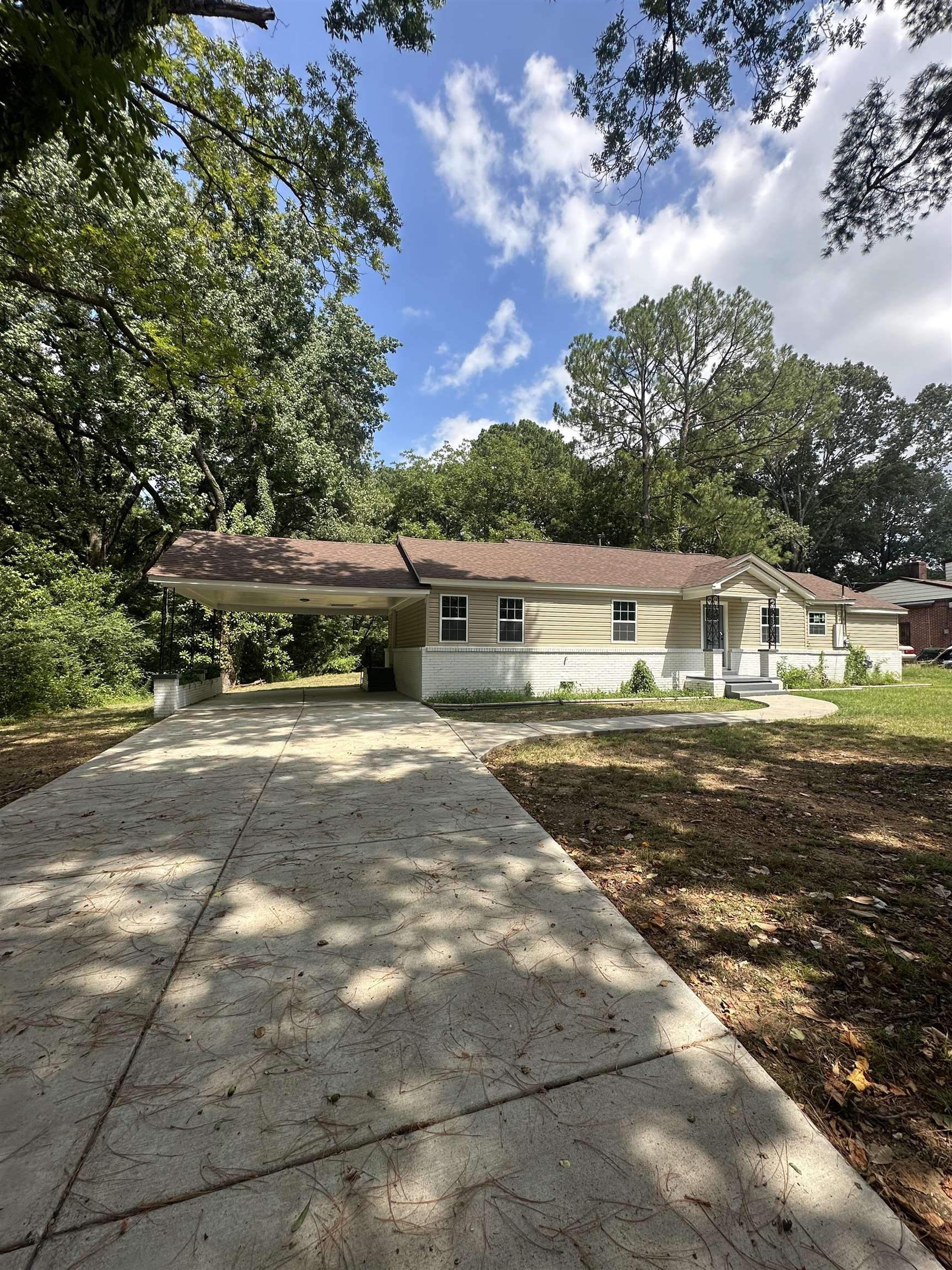 3402 Lakeview Road Memphis, TN 38116 - Photo 26 of 30 Ranch-style home with concrete driveway and an attached carport