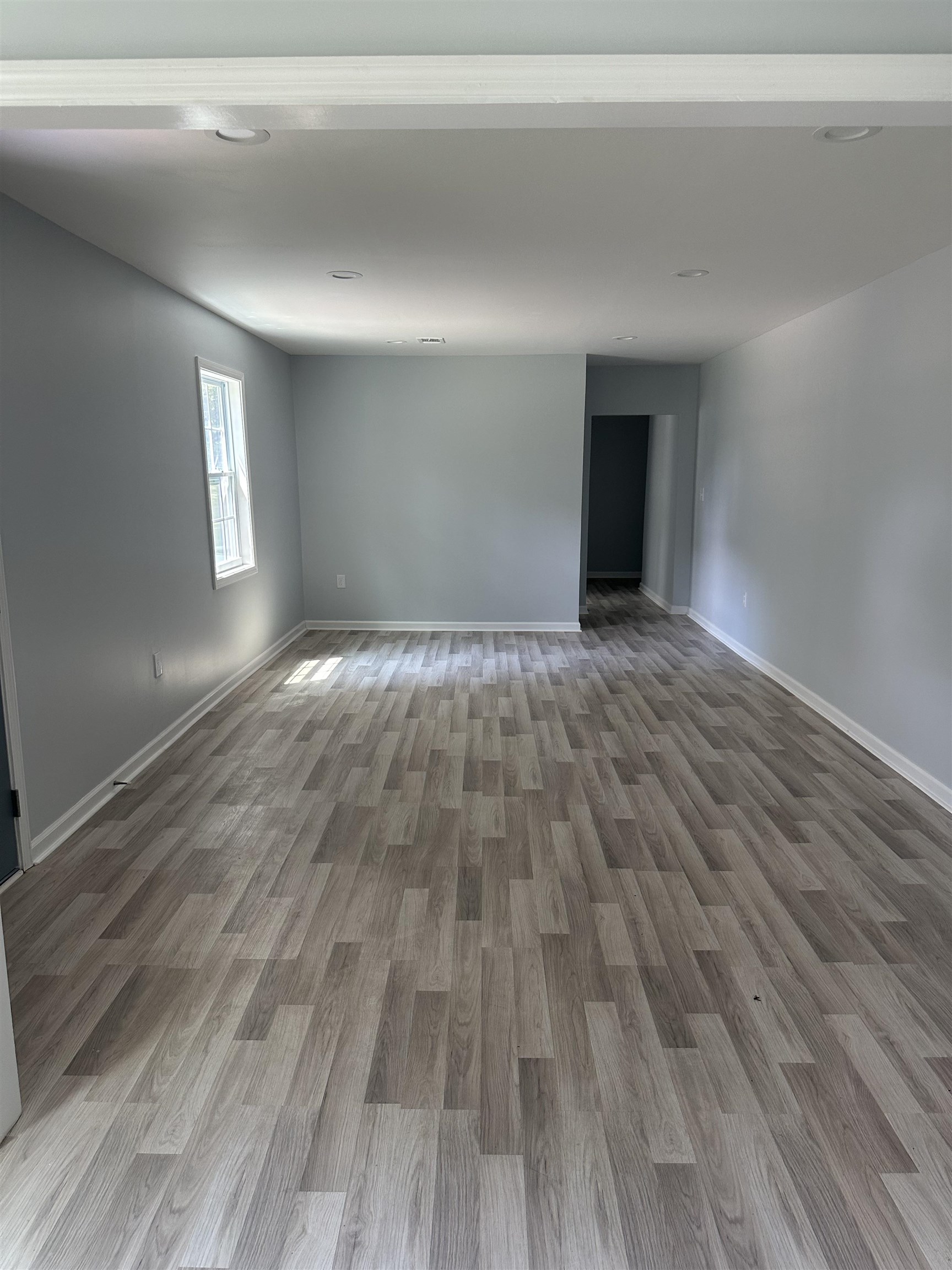 3402 Lakeview Road Memphis, TN 38116 - Photo 3 of 30 Spare room with baseboards and wood finished floors