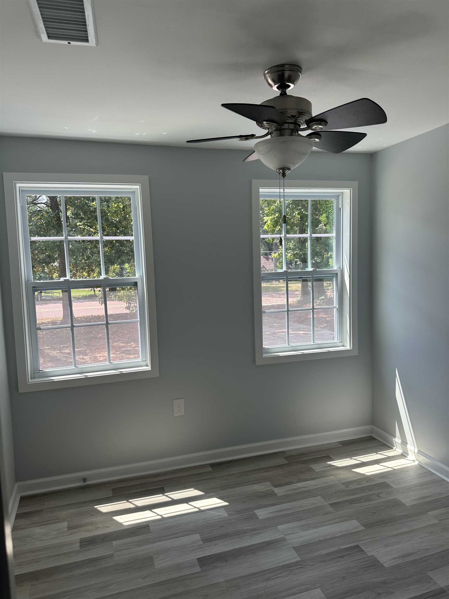 3402 Lakeview Road Memphis, TN 38116 - Photo 6 of 30 Unfurnished room with wood finished floors and ceiling fan