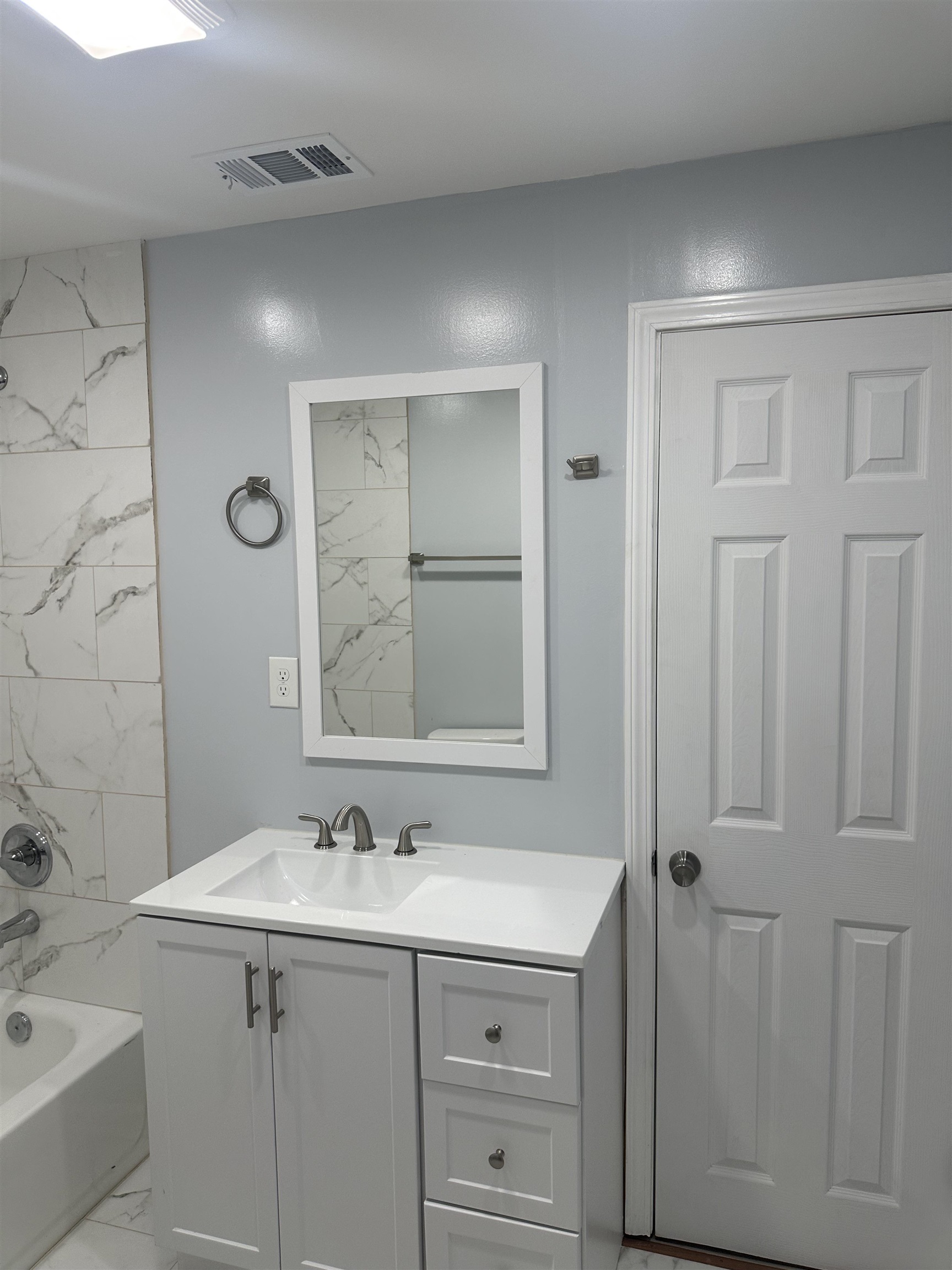 3402 Lakeview Road Memphis, TN 38116 - Photo 7 of 30 Bathroom featuring marble finish flooring, vanity, and shower / bathtub combination