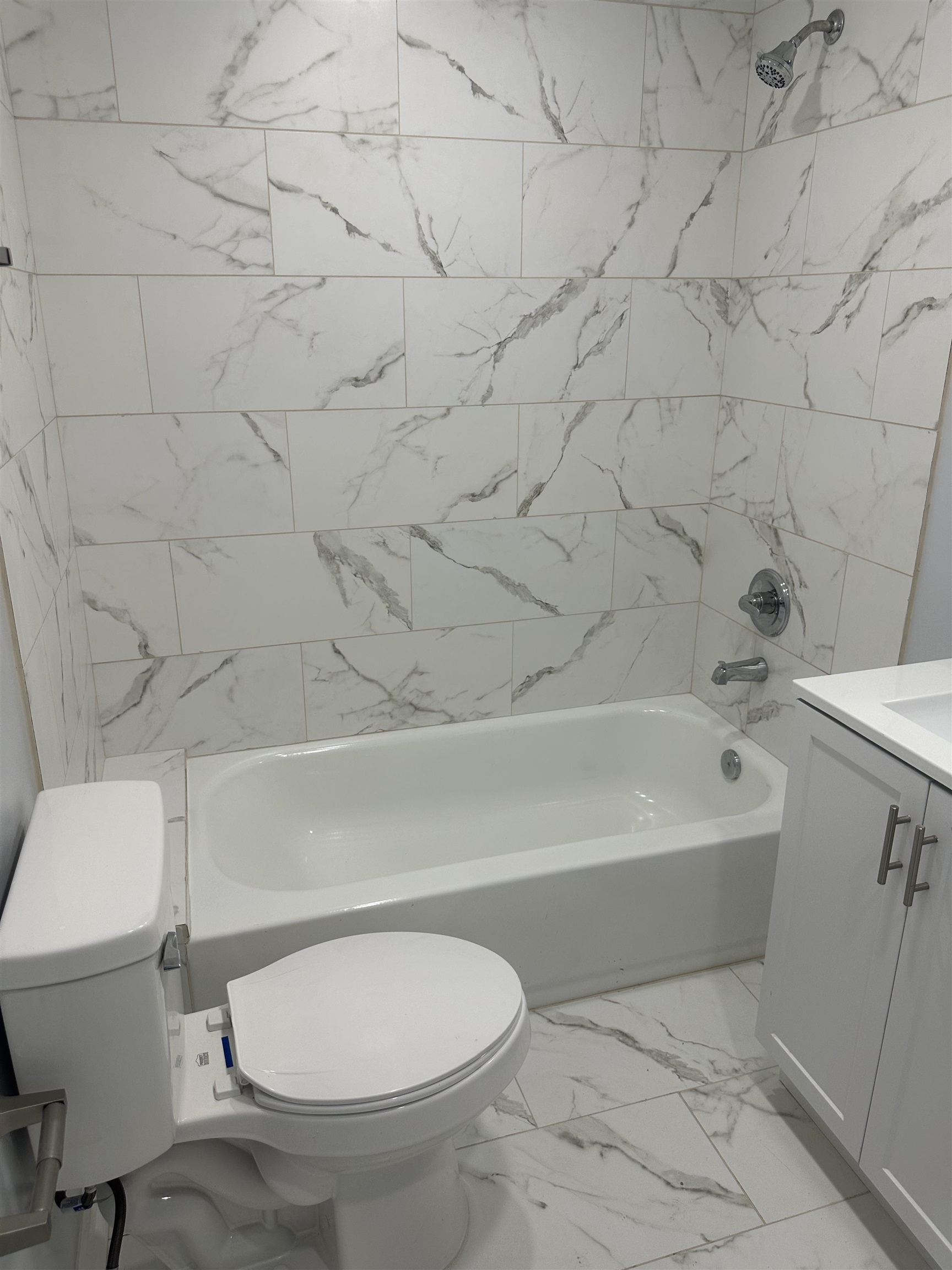 3402 Lakeview Road Memphis, TN 38116 - Photo 8 of 30 Bathroom with marble finish floors, shower / bathtub combination, and vanity