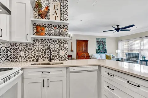 a view of cabinets and window