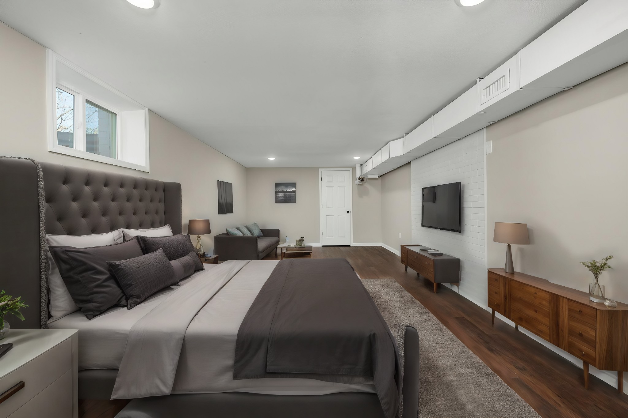 2771 Kinneys Road Cedar Hill, TN 37032 - Photo 33 of 45 a bedroom with a bed and a flat screen tv