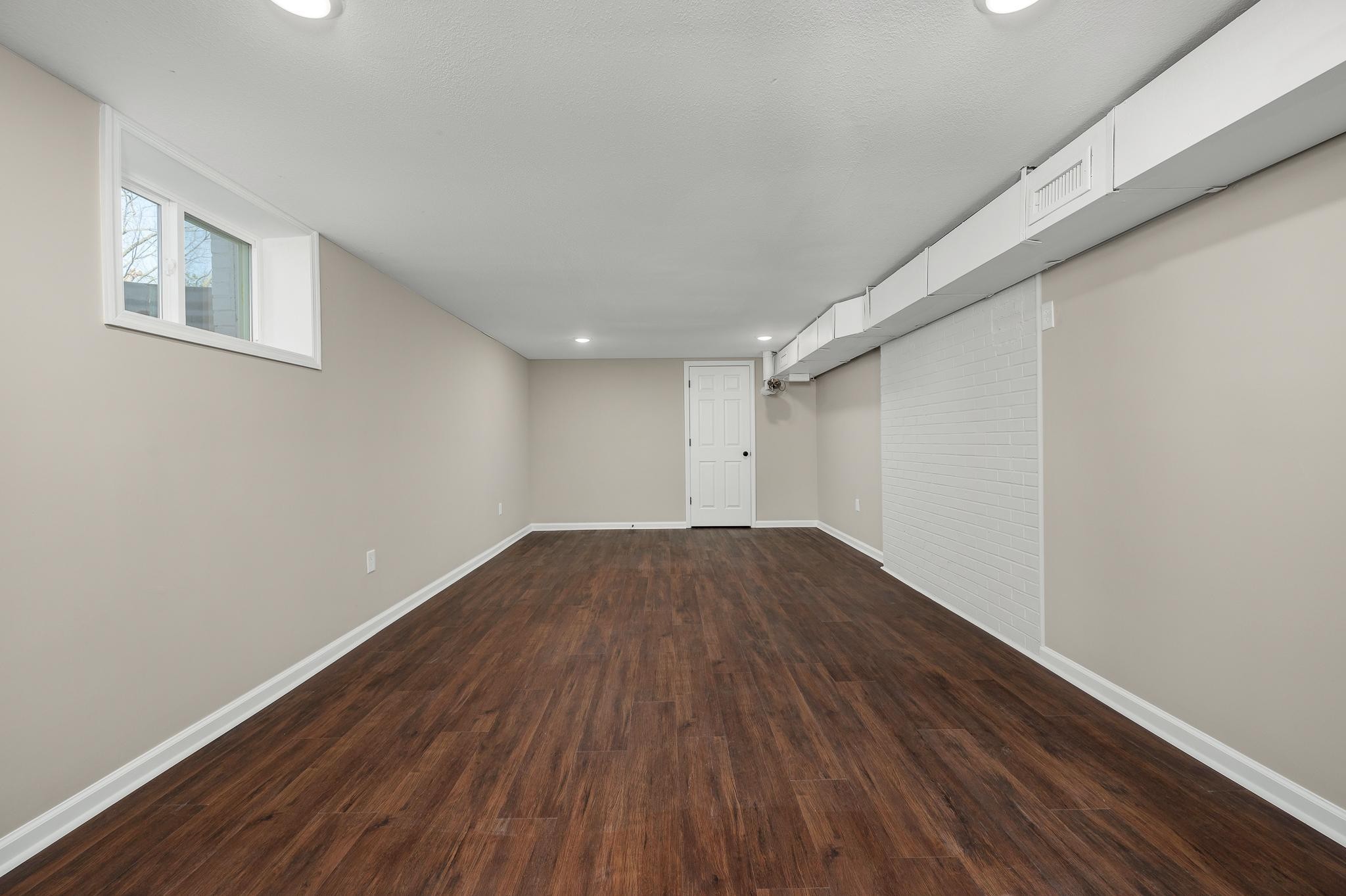 2771 Kinneys Road Cedar Hill, TN 37032 - Photo 34 of 45 a view of empty room with wooden floor