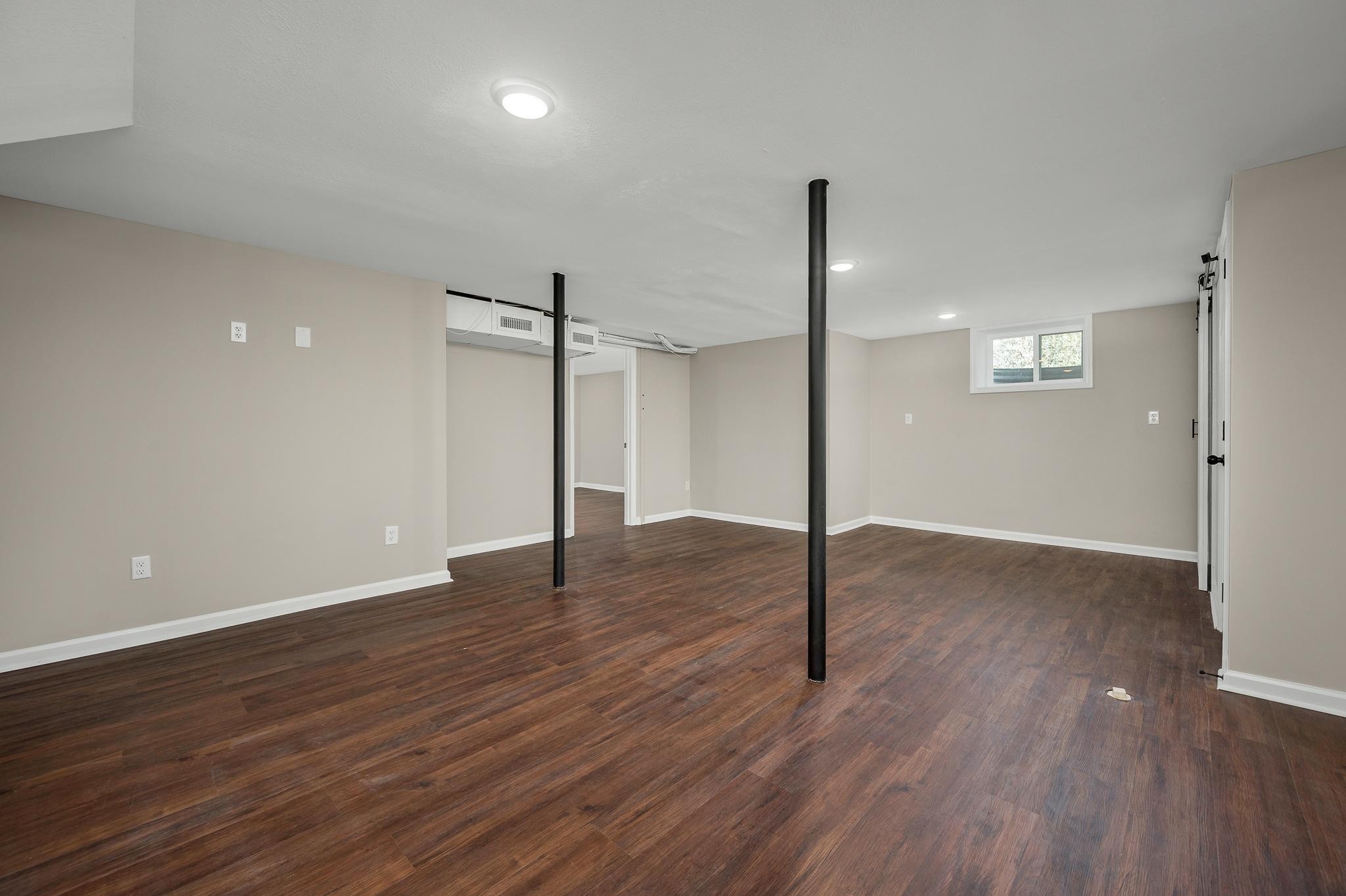 2771 Kinneys Road Cedar Hill, TN 37032 - Photo 38 of 45 a view of empty room with wooden floor and fan