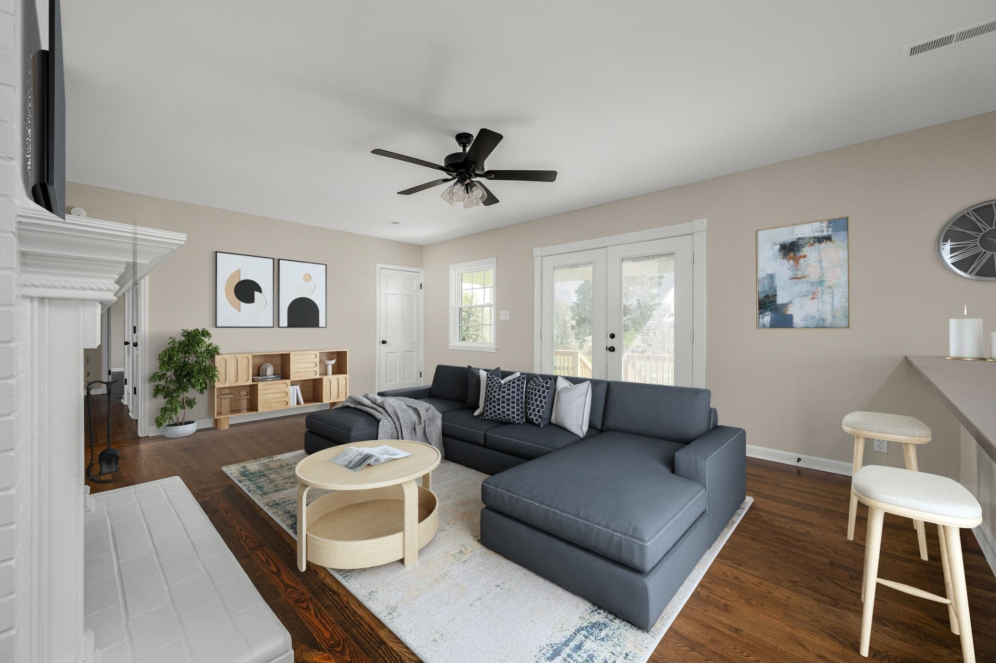 2771 Kinneys Road Cedar Hill, TN 37032 - Photo 6 of 45 a living room with furniture a fireplace and a flat screen tv