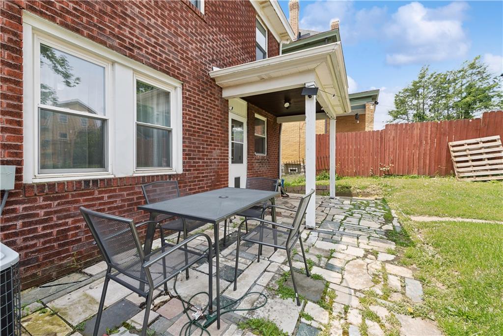 53 Calhoun Avenue Pittsburgh, PA 15210 - Photo 25 of 30 a view of a house with backyard and sitting area