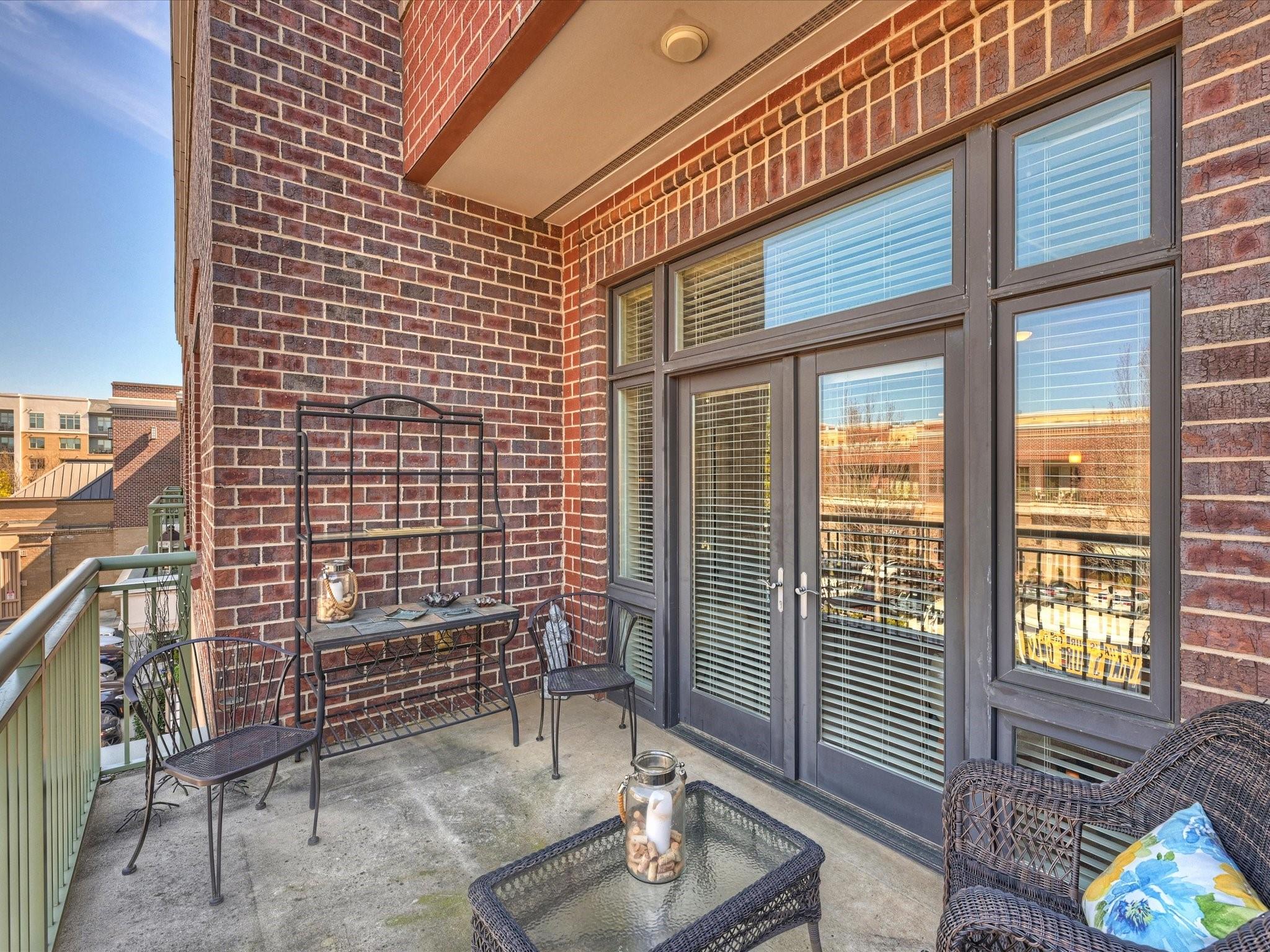3920 Sharon Road, Unit 210 Charlotte, NC 28211 - Photo 26 of 34 a view of an outdoor space with porch