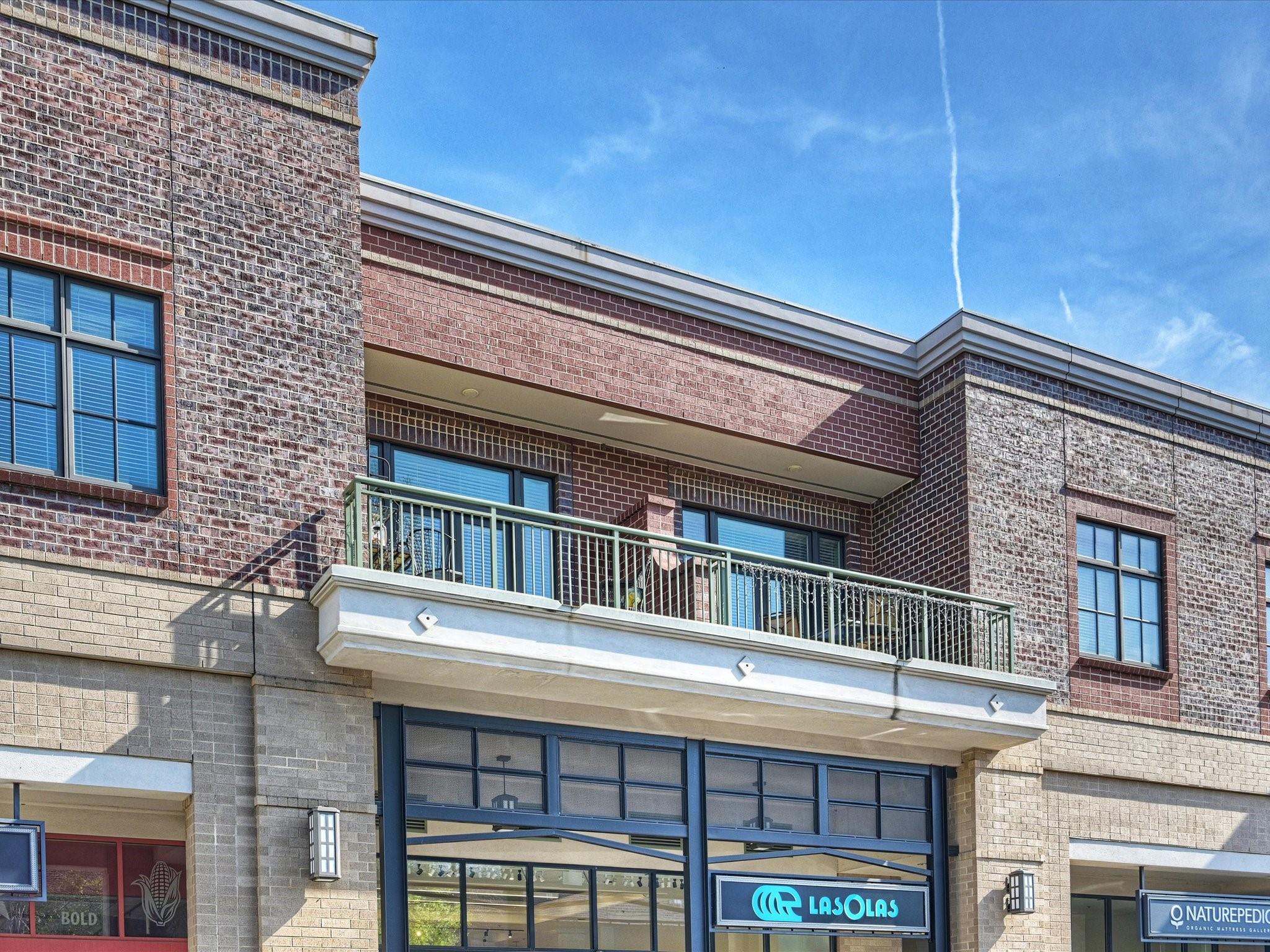 3920 Sharon Road, Unit 210 Charlotte, NC 28211 - Photo 3 of 34 a building view with outdoor space