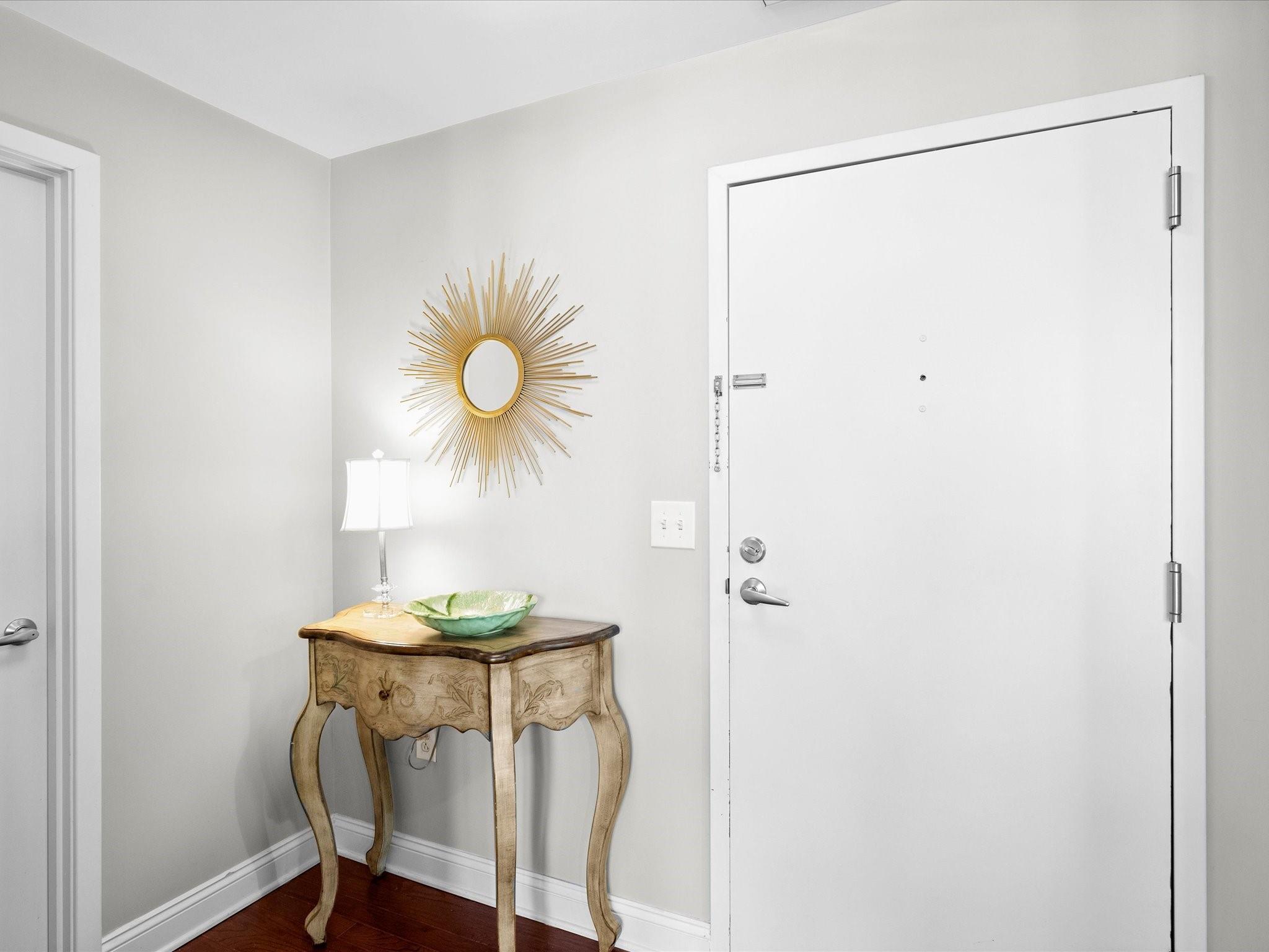 3920 Sharon Road, Unit 210 Charlotte, NC 28211 - Photo 5 of 34 a view of a room with a table and a chair