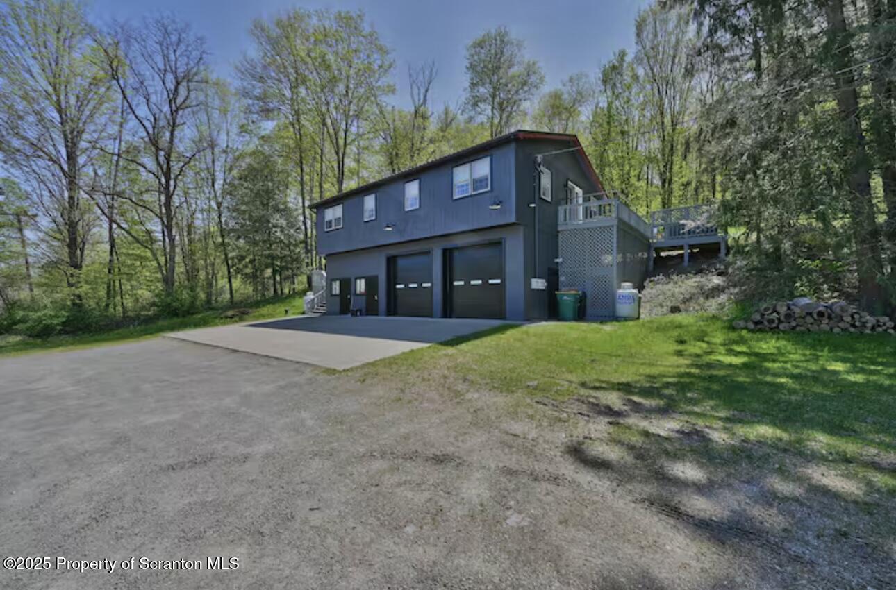 4562 Highway 374 Nicholson, PA 18446 - Photo 1 of 43 a view of a house with a yard