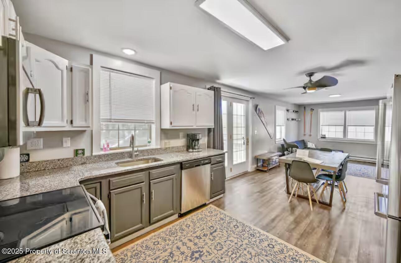 4562 Highway 374 Nicholson, PA 18446 - Photo 11 of 43 a kitchen with lots of counter top space and dining table