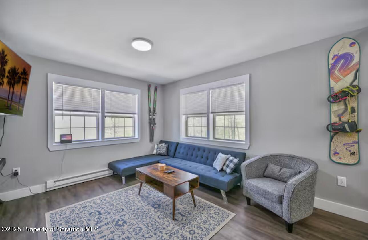 4562 Highway 374 Nicholson, PA 18446 - Photo 22 of 43 a living room with furniture and a window