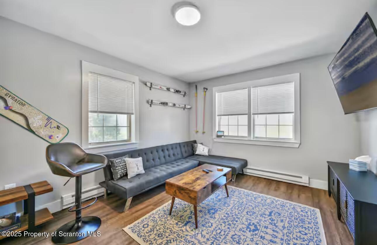4562 Highway 374 Nicholson, PA 18446 - Photo 25 of 43 a living room with furniture and a window