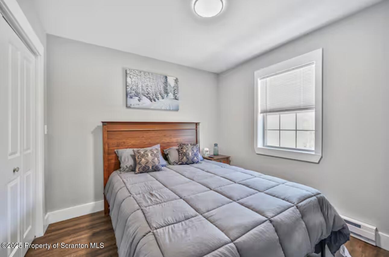 4562 Highway 374 Nicholson, PA 18446 - Photo 29 of 43 a bedroom with a bed and a window