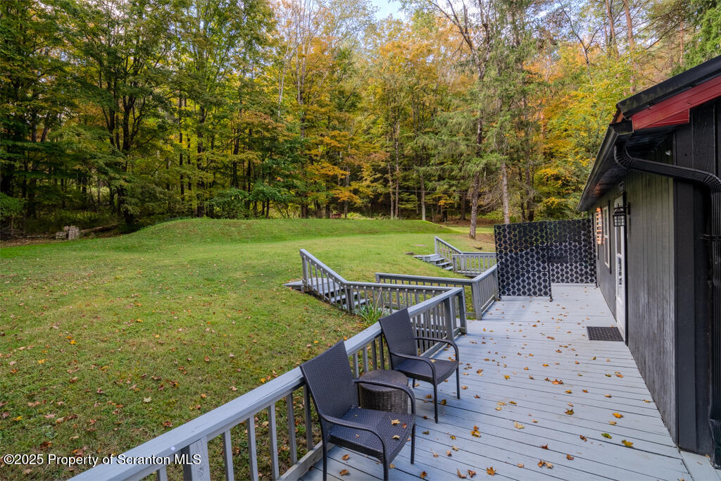 4562 Highway 374 Nicholson, PA 18446 - Photo 33 of 43 a view of a patio with chair and table