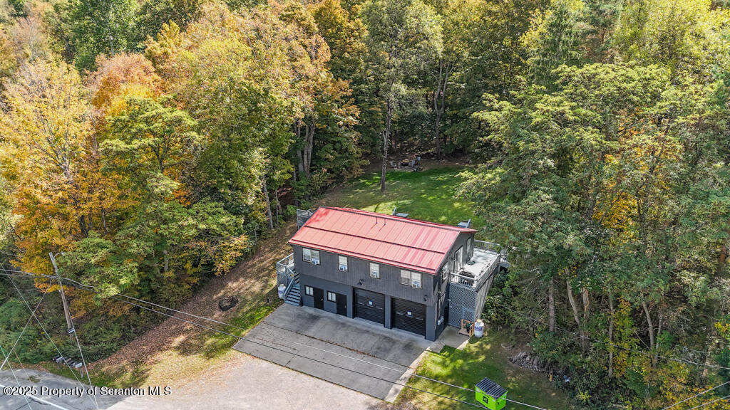 4562 Highway 374 Nicholson, PA 18446 - Photo 37 of 43 a view of a deck and backyard of house