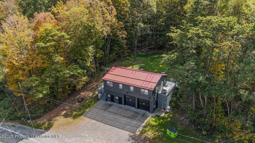 4562 Highway 374 Nicholson, PA 18446 - Photo 7 of 43 a pathway of a house with a yard