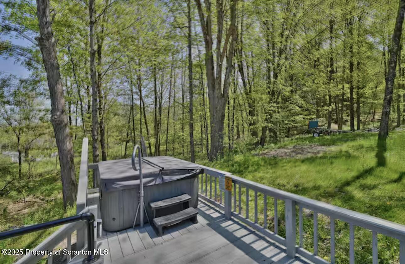 4562 Highway 374 Nicholson, PA 18446 - Photo 8 of 43 a view of a balcony with chairs