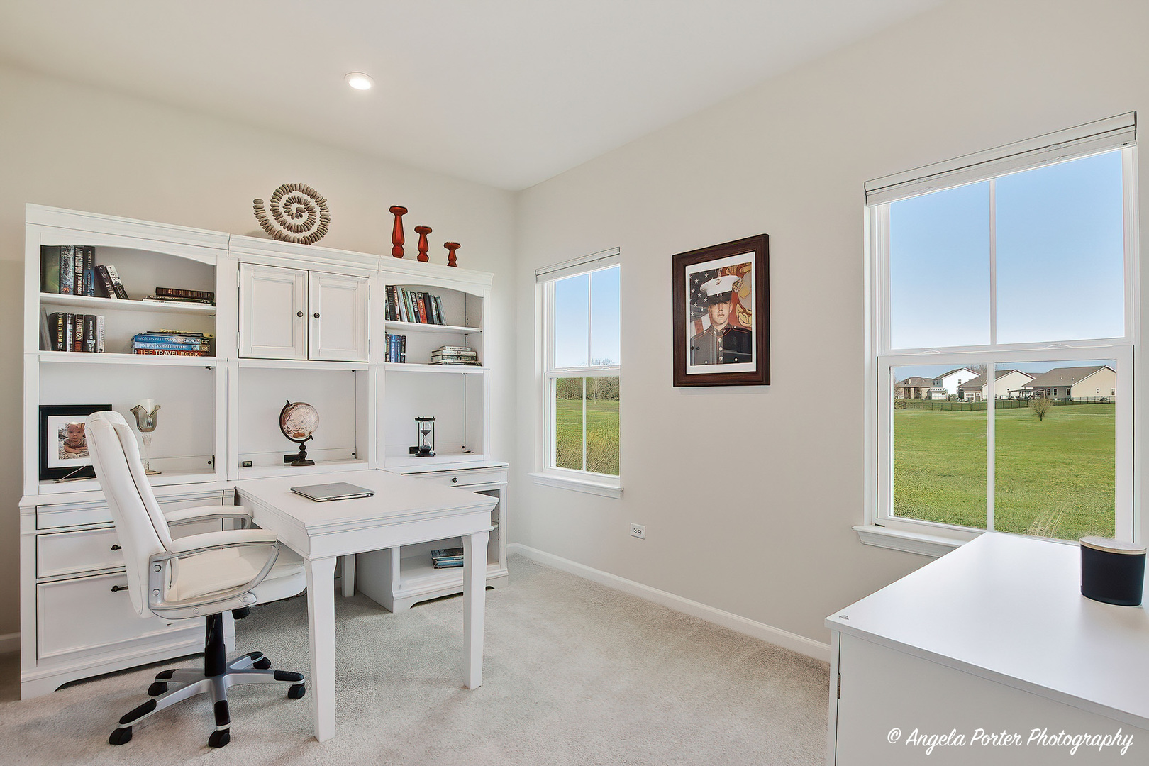 7443 Alexandra Lane Union, IL 60180 - Photo 16 of 39 a view of a workspace with furniture and a window