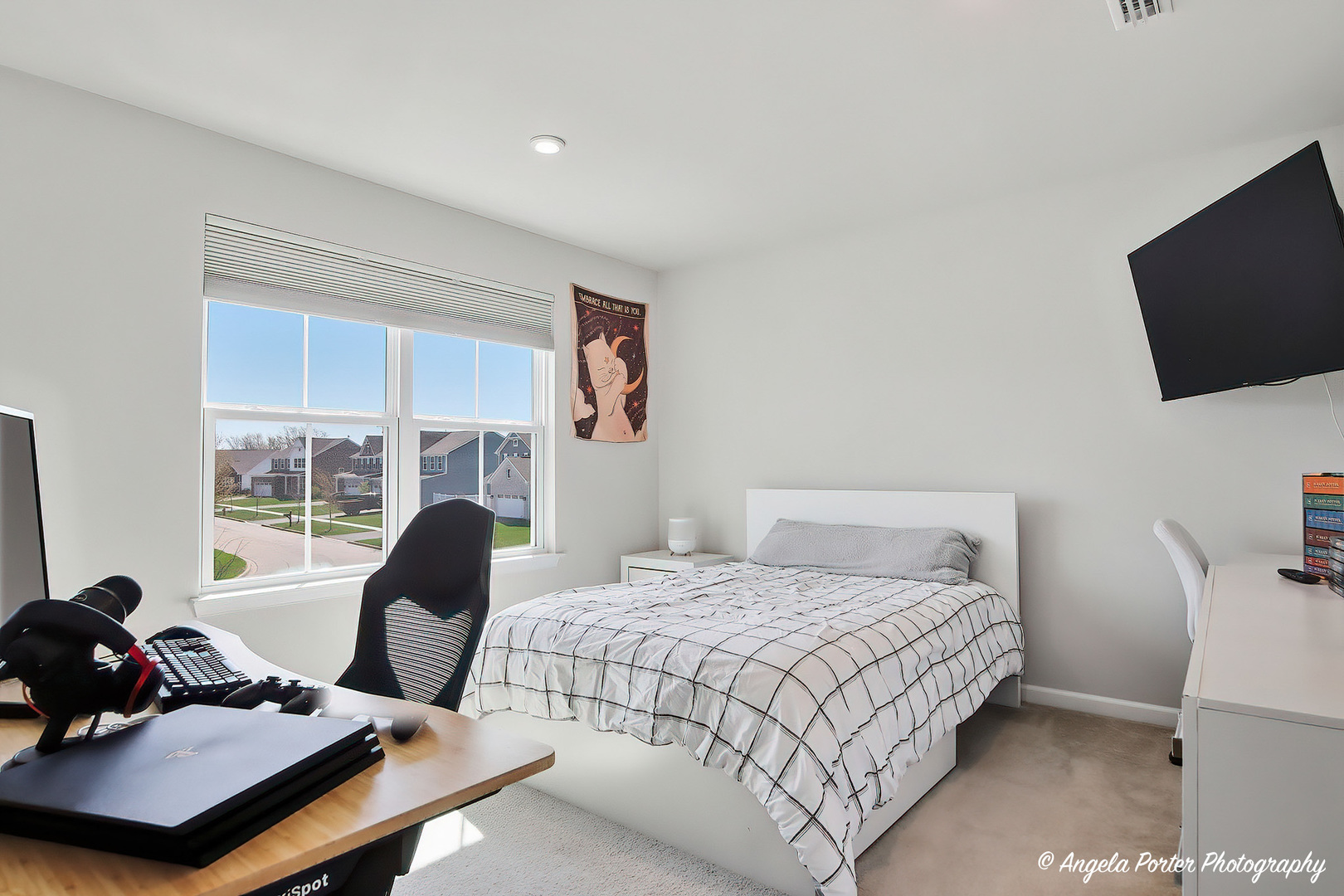 7443 Alexandra Lane Union, IL 60180 - Photo 19 of 39 a bedroom with a bed and a flat screen tv