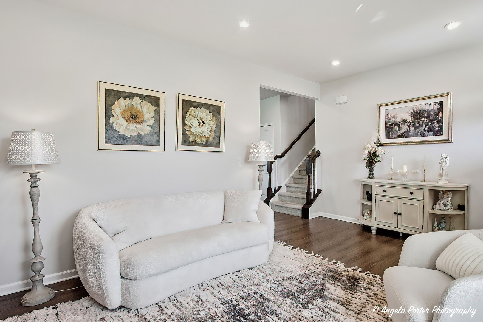 7443 Alexandra Lane Union, IL 60180 - Photo 2 of 39 a living room with furniture and a painting