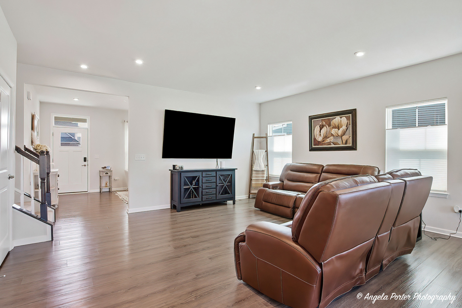 7443 Alexandra Lane Union, IL 60180 - Photo 6 of 39 a living room with furniture and a flat screen tv