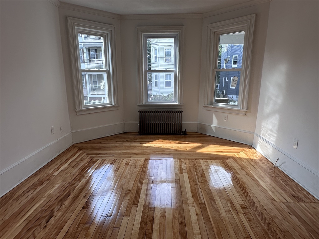 46 Theodore Street Boston, MA 02124 - Photo 15 of 32 an empty room with window