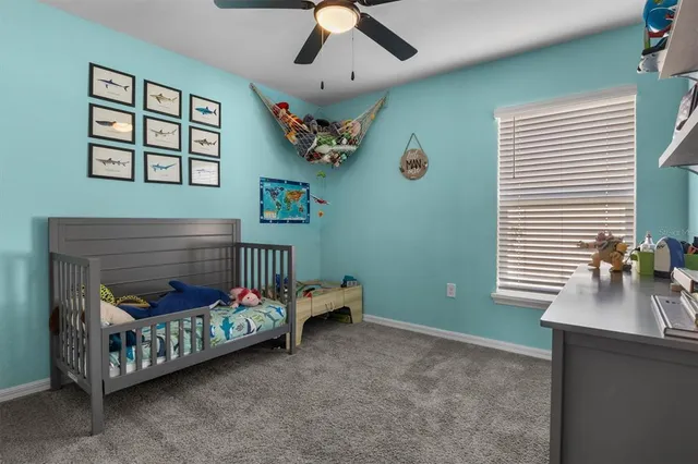 a bedroom with furniture and a bed