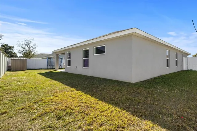 a view of a backyard with a garden